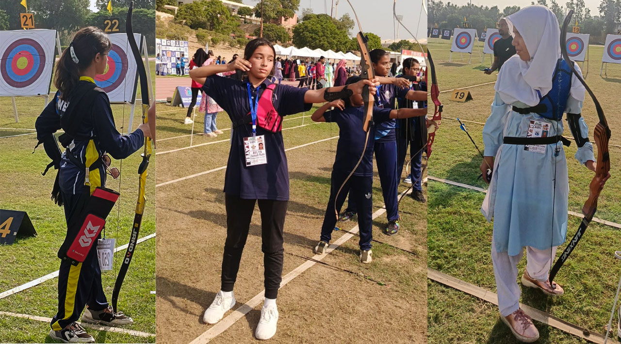 Girls participants aiming arrows